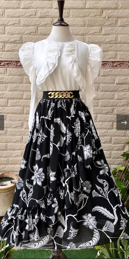 White top with black printed chiffon skirt – mannequin front view
