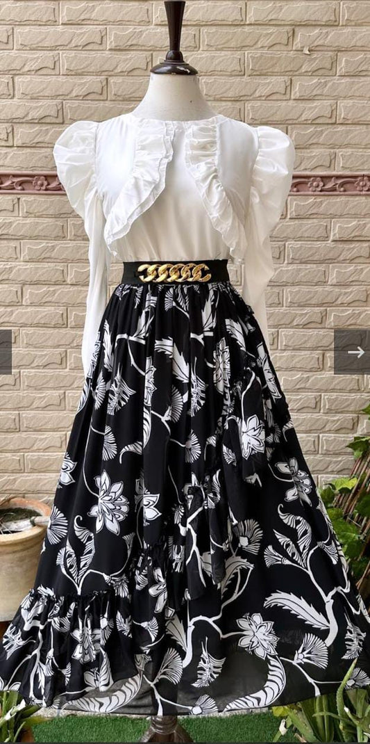 White top with black printed chiffon skirt – mannequin front view
